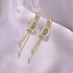 D Shaped Long Tassel Earrings